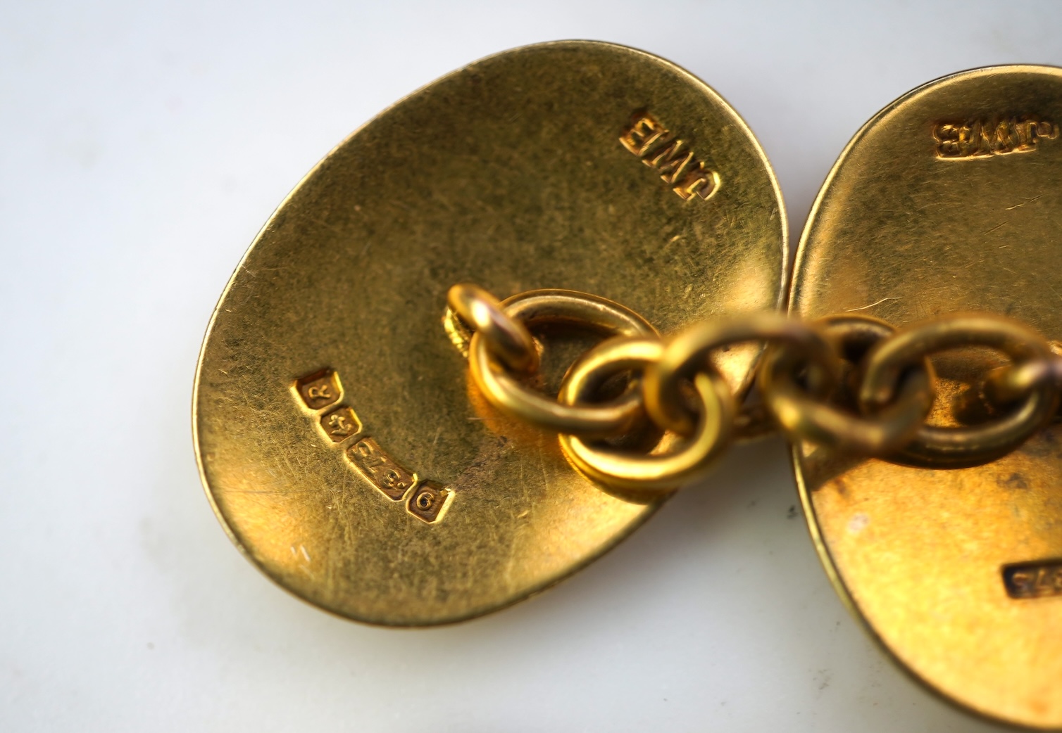 A pair of 9ct gold and enamel cufflinks, circa 1966